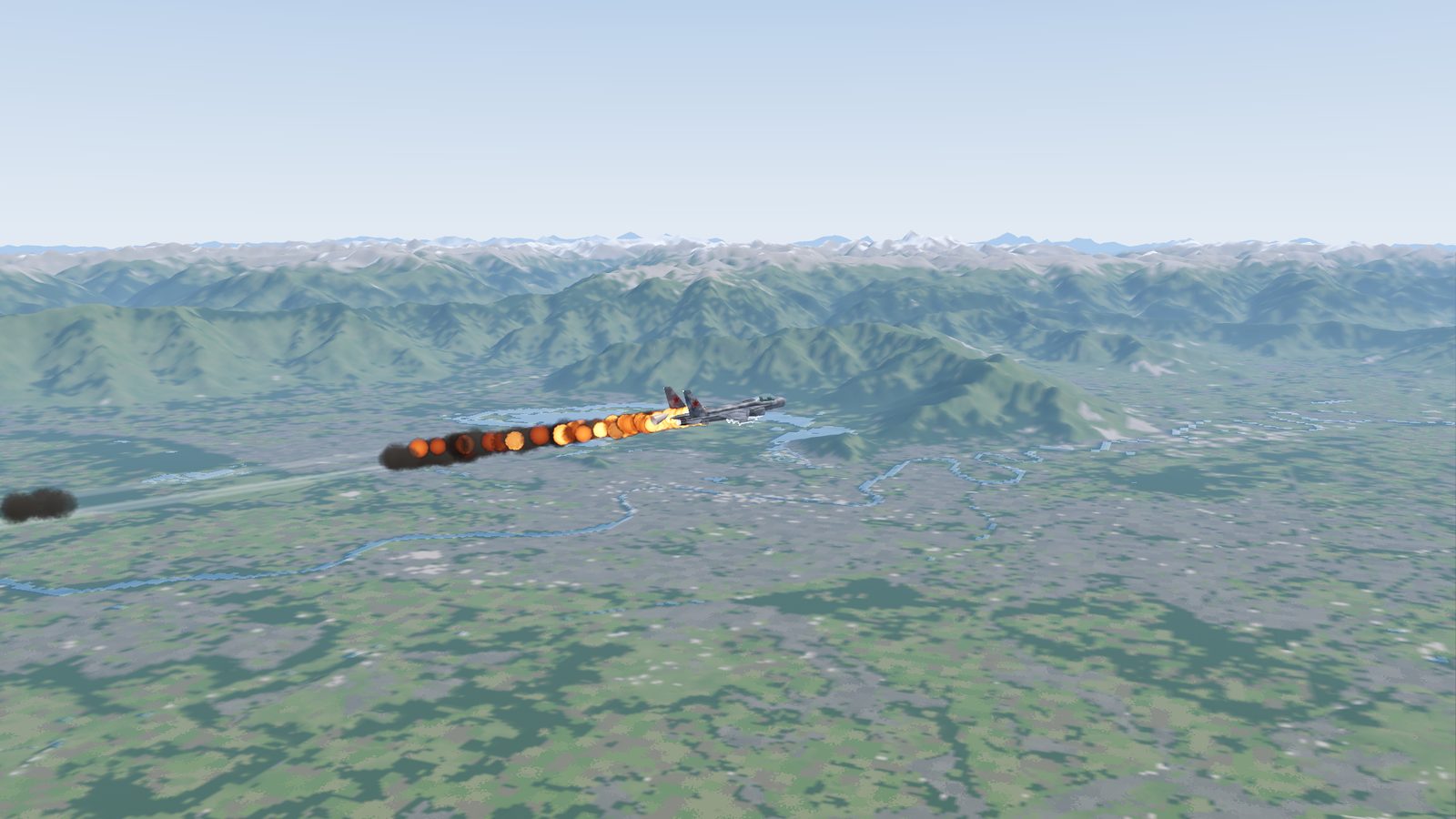 A Su-27 hit by a missile in FlightOut: fire and smoke pouring from it as it breaks up and falls